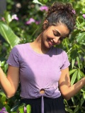 anupama-parameswaran-in-ribbed-short-sleeved-crop-top-in-a-soft-lavender-shade-and-black-pants-comfortable-daytime-wear-photos-004