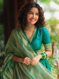 anupama-parameswaran-in-teal-blue-green-long-fitted-top-blouse-V-neckline-and-elbow-length-sleeves-with-patterned-cuffs-Lehenga-Set-photos-002