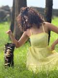 anupama-parameswaran-in-yellow-colour-frock-outfit-style-photos-017
