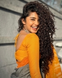 anupama-parameswaran-in-yellow-border-saree-photos-006