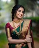 anupama-parameswaran-traditional-bridal-look-in-green-saree-photos-002