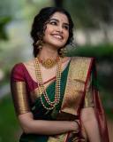 anupama-parameswaran-traditional-bridal-look-in-green-saree-photos-004