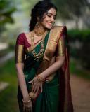 anupama-parameswaran-traditional-bridal-look-in-green-saree-photos-005