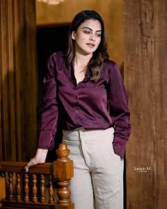 anusree-in-light-color-pants-with-purple-shirt-photos-003