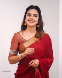 anusree-in-red-chiffon-saree-004