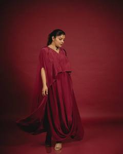 aparna-balamurali-in-deep-maroon-cape-style-gown-design-photos-001