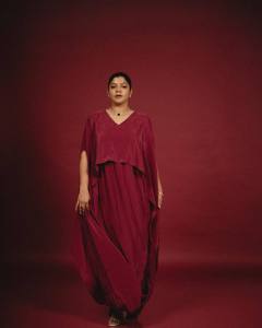 aparna-balamurali-in-deep-maroon-cape-style-gown-design-photos-003