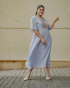 aparna-balamurali-in-light-clour-long-top-dress-photos-001