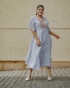 aparna-balamurali-in-light-clour-long-top-dress-photos-004