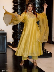 aparna-balamurali-in-sun-yellow-silk-blend-Anarkali-suit-set-photos-001