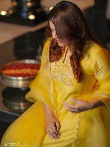 aparna-balamurali-in-sun-yellow-silk-blend-Anarkali-suit-set-photos-002