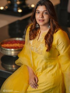 aparna-balamurali-in-sun-yellow-silk-blend-Anarkali-suit-set-photos