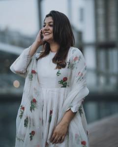aparna-balamurali-in-white-floral-print-anarkali-casual-wear-churidar-dress-photos.balamurali-3