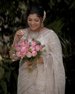 aparna-balamurali-latest-onam-2022-photos-in-Tiya-neil-karikkassery-saree-001
