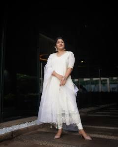 aparna-balamurali-latest-photos-in-white-churidar-001