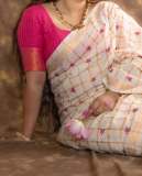 aparna-balamurali-in-ivory-organza-saree-contrasting-magenta-pink-silk-blouse-and-Soft-smoky-eye-warm-muted-nude-pink-lip-color-pics-014