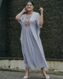 aparna-balamurali-in-light-clour-long-top-dress-photos