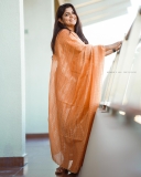 aparna-balamurali-in-orange-dress-002