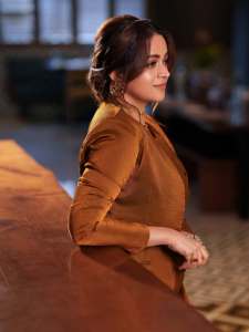 bhavana-actress-in-rich-mustard-brown-symmetrical-tulip-style-draped-dhoti-skirt-dress-photos-003