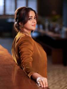 bhavana-actress-in-rich-mustard-brown-symmetrical-tulip-style-draped-dhoti-skirt-dress-photos-009