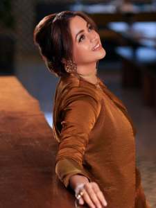 bhavana-actress-in-rich-mustard-brown-symmetrical-tulip-style-draped-dhoti-skirt-dress-photos-014