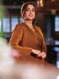 bhavana-actress-in-rich-mustard-brown-symmetrical-tulip-style-draped-dhoti-skirt-dress-photos-008