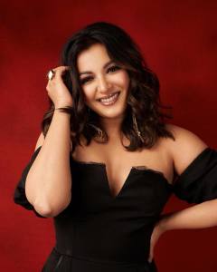 catherine-tresa-in-black-jumpsuit-photos-005