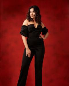 catherine-tresa-in-black-jumpsuit-photos-006