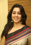 Actress Charmi Stills in Multi Color Printed Saree