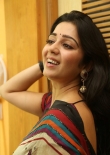 Actress Charmi in Multi Color Printed Saree Stills