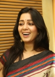 Actress Charmi Stills in Multi Color Printed Saree