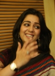 Actress Charmi Stills in Multi Color Printed Saree