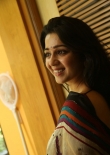 Actress Charmy Kaur Stills in Multi Color Printed Saree