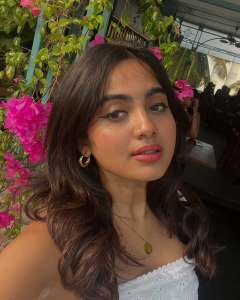 devika-sanjay-in-white-off-shoulder-top-with-jeans-short-skirt-photos-002