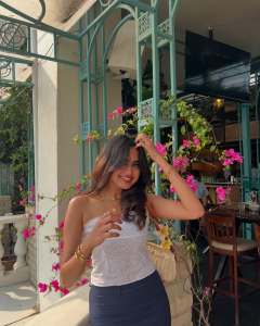 devika-sanjay-in-white-off-shoulder-top-with-jeans-short-skirt-photos