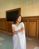 devika-sanjay-in-sheer-fluid-white-saree-likely-organza-or-tissue-chiffon-featuring-a-fine-white-lace-border-along-the-edges-with-same-colour-blouse-photos-005