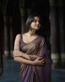 devika-sanjay-in-violet-tissue-saree-photos-007