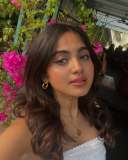 devika-sanjay-in-white-off-shoulder-top-with-jeans-short-skirt-photos-002