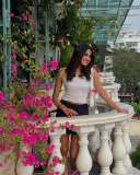 devika-sanjay-in-white-off-shoulder-top-with-jeans-short-skirt-photos-005