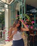 devika-sanjay-in-white-off-shoulder-top-with-jeans-short-skirt-photos