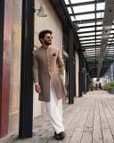 dulquer-salmaan-in-Indo-Western-layered-jacket-and-trouser-combination-dress-photos