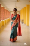durga-krishna-in-green-saree-photos-004