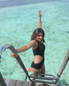 esther-anil-in-black-swimsuit-dress-photos-001