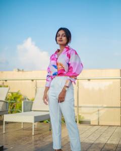 esther-anil-in-white-pants-and-multicolor-shirt