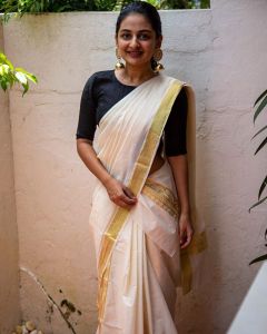 esther anil latest onam saree photos