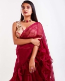 esther-anil-new-photos-in-red-saree-style-002