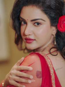 honey-rose-in-rani-red-color-anarkali-net-design-photos
