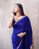 honey-rose-in-blue-saree-with-sleeveless-blouse-photos-003