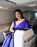 honey-rose-in-blue-saree-with-sleeveless-blouse-photos-005
