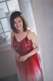 honey-rose-in-red-sleeveless-dress-photos-005
